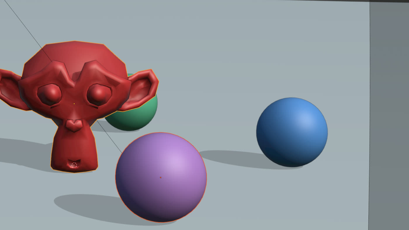 Blender scene seen in the AR glasses: a red monkey head and colored spheres.